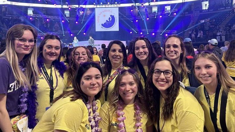 Representatives from Penn State DuBois, including this year’s THON dancers from the campus, gather on the dance floor at the Bryce Jordan Center during THON 2025.